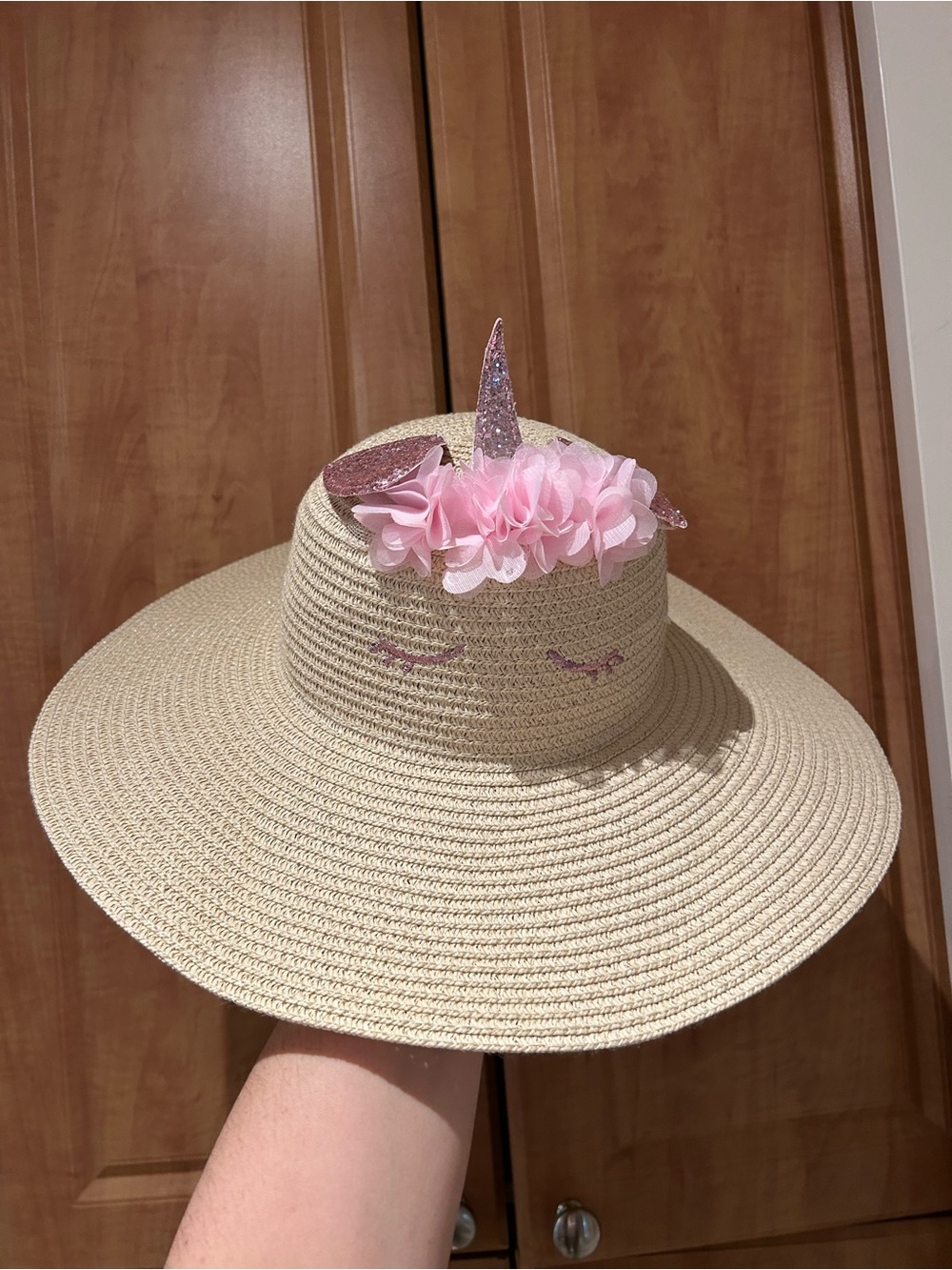 Kids Beige Straw Unicorn Sun Hat with Pink Accents 15.5” diameter.